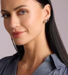 Tube Huggie Hoops in Rhodium Plating on 925 Silver - Ash & Harry