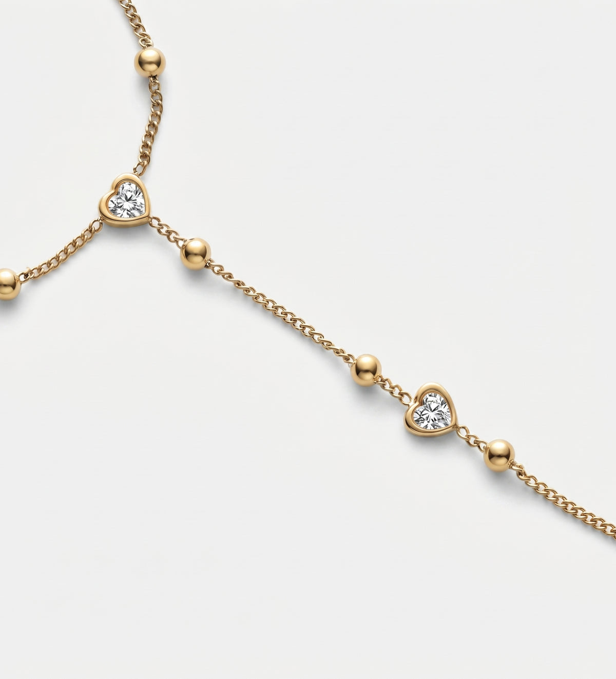 Heart Drop Hand Chain in Gold With High Quality Simulated Diamonds - Ash & Harry